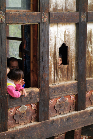 Jakar, Bhutan - September 26th 2007: Unidentified spectators watching sacred ceremony in Thangbi Lhakhangのeditorial素材