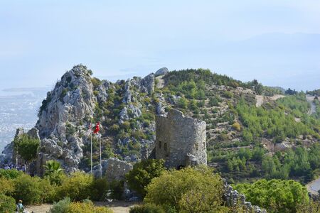 Kyrenia, Cyprus - October 17th 2015: Unidentified tourists by sightseeing of impressive medieval fortress of St. Hilarionの写真素材