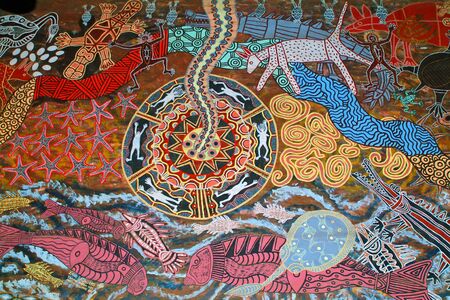 Kuranda, Australia - March 1st 2005: Aborigines painting in traditional styleのeditorial素材