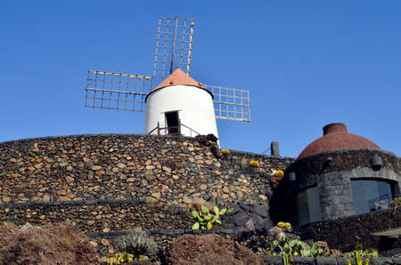 windmill over Jardin de Cactus in Lanzarote,の写真素材