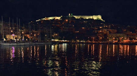 Greece, Kavala, illuminated fortress and harborのeditorial素材