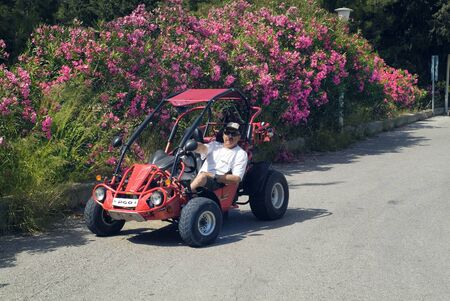 Cos, Greece - May 23rd 2009: man in buggy, a preferred mode of transport for tourists