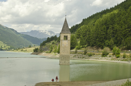 Italy, sunken church spire in Reschen Lake - Lago di Resia - in South Tyrolのeditorial素材