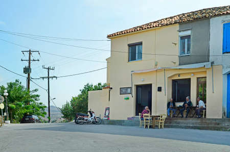 Kaspakas, Greece - September 21st 2015: Unidentified men in front of Kafenion - Cafe in mountain village on Lemnos Islandのeditorial素材