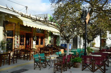 Mochos, Greece - December 22nd 2013: Unidentified men in typical traditional restaurant and cafe - tavern - in the mountain village in Creteのeditorial素材