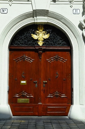 Vienna, Austria - March 27th 2016: Entrance with symbol of Habsburg monarchy, constitution court of Austria on Jewish Square in inner districtのeditorial素材