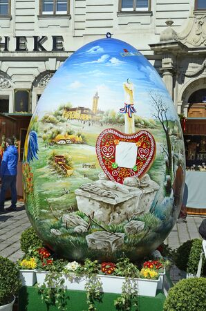 Vienna, Austria - March 27th 2016: Arful decorated giant easter egg on traditional Easter market on Freyung squareのeditorial素材