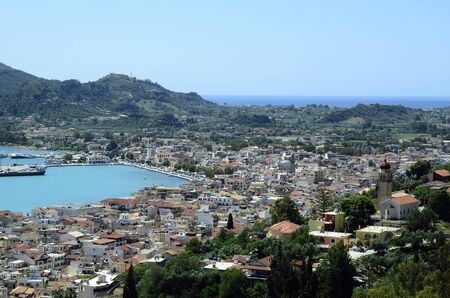 Greece, Zakynthos Town, cityscape with different buildings and harborの写真素材