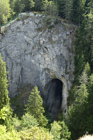 Chepelare, Bulgaria -September 24, 2016: Unidentified people on natural arches named wonderful bridges in Rhodope mountains, preferred place for hiking and use a rope slide through natural archesのeditorial素材