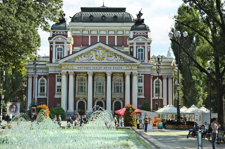 Sofia, Bulgaria - September 25th 2016: Unidentified people in city park named Gradska Gradina with fountain and national theater Ivan Vazovのeditorial素材