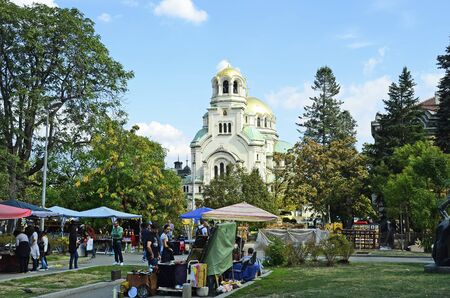 Sofia, Bulgaria - September 25th 2016: Unidentified people on flea market in front of impressive Aleksandar Nevski cathedralのeditorial素材