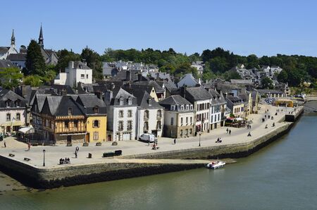 Auray, France - June 08, 2011: Unidentified people, buildings and restaurants in the medieval village in Brittany on river Lochのeditorial素材