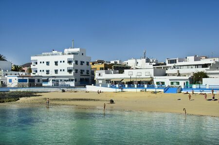 Fuerteventura, Spain - March 29, 2017: Unidentified people and buildings on beach in Correlejo on Canary Islandのeditorial素材