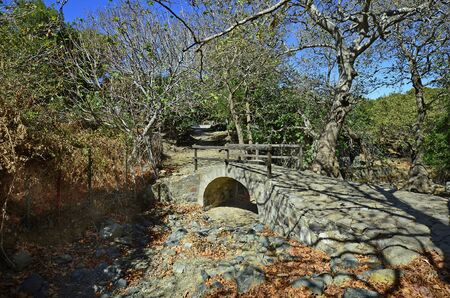 Greece, Samothrace, way with tiny bridge in Sanctuary of the great gods in Palaeopolisの写真素材