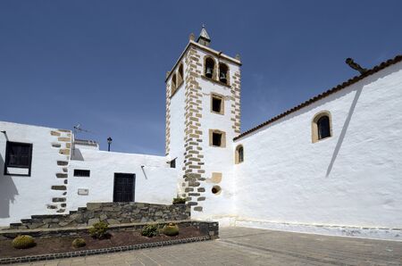 Spain, Canary Island, Fuerteventura, bell tower of church Santa Maria de Betancuriaの写真素材