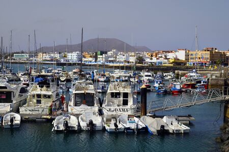 Corralejo,  Fuerteventura, Spain - April 02, 2017: Different boats in yacht harbor of the city on Canary Islandのeditorial素材