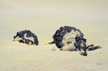 Spain, Canary Island, Fuerteventura, lava rock in the dunes of nature park El Jable