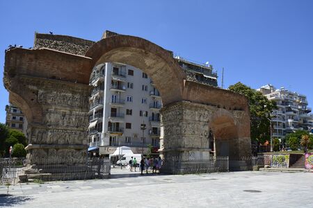 Thessaloniki, Greece - June 09, 2017: Unidentified people and ancient Arch of Galerius in the city in Central Macedoniaのeditorial素材