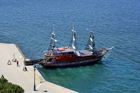 Thessaloniki, Greece - June 09, 2017: Cruising ship on promenade along shore of Aegean seaのeditorial素材