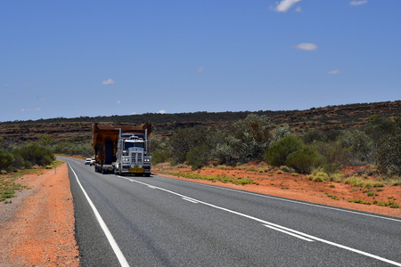 Australia, Northern Territory - November 15, 2017: Heavy oversize transport with truck named Road Train on Stuart Highwayのeditorial素材