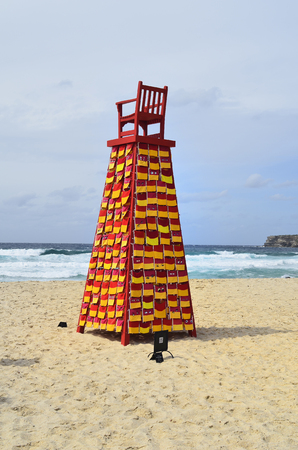 Sydney, NSW, Australia - October 31,2017: Sculpture by the sea - an outdoor exhibtion along the coast in Bondi, Lookout For Me artwork from artist Linton Meagher on Tamarama beachのeditorial素材