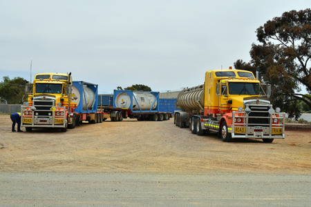 Mannahill, SA, Australia - November 11, 2017: Trucks named Road Train with heavy transport on Barrier Highway in South Australiaのeditorial素材