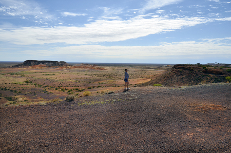 Coober Pedy, SA, Australia - November 13, 2017: Unidentified woman on breakout at the breakaway national parkのeditorial素材