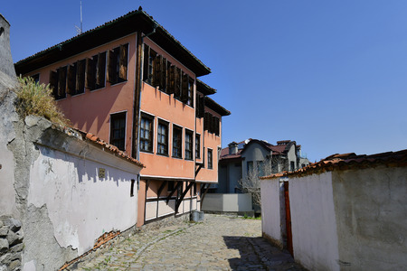 Plovdiv, Bulgaria - June 08, 2018: Building in traditional structure and cobbled street in old town districtのeditorial素材