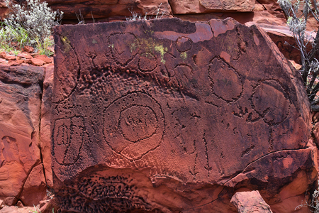 Australia, NT, public Ewaninga Conservation Reserve, area with prehistoric engravings and Aborigines historical site, rock with lichensの写真素材