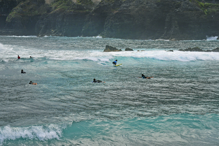 Tenerife, Canary Islands, Spain - April 01, 2018: Unidentified surfers in Atlantic ocean in Puerte de la Cruzのeditorial素材