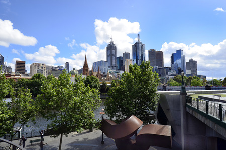 Melbourne, VIC, Australia - November 04, 2017: Cityscape to Federation Square, St.Pauls cathedral and Flinders Street Station with Princes bridge over Yarra riverのeditorial素材