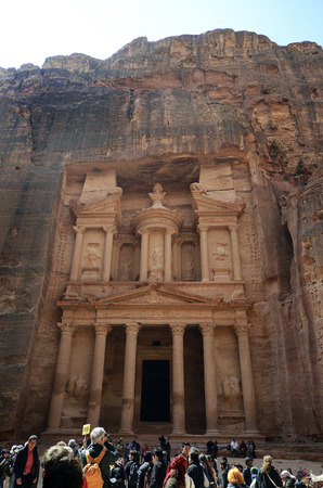 Petra, Jordan - March 06, 2019: Unidentified tourists in front of Treasury aka Al-Kazneh in ancient Petra, a Unesco World Heritage siteのeditorial素材