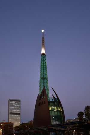Perth, WA, Australia - November 30, 2017: Illuminated Bell Tower aka Swan Bells on evening with full moon on top, landmark of the capital in Western Australiaのeditorial素材