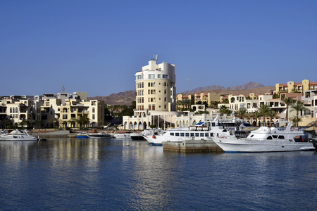 Aqaba, Jordan - March 04, 2019: Marina with boats in Tala Bay Resort on Red Seaのeditorial素材