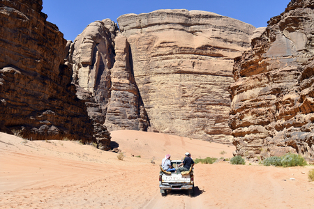 Wadi Rum, Jordan - March 07, 2019: Unidentified tourists in pick-up car by sightseeing in Middle Eastのeditorial素材