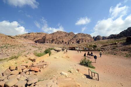 Petra, Jordan - March 06, 2019: Unidentified people, shops, horses and donkeys in ancient Petraのeditorial素材