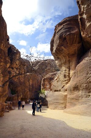 Petra, Jordan - March 06, 2019: Unidentified people on canyon named As Siq, footpath to ancient Petraのeditorial素材
