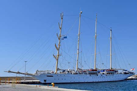 Kavala, Greece - June 13, 2019: Luxury sailing ship in the harbor of the city on Aegean sea