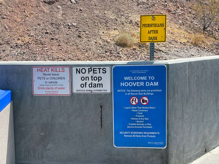 Boulder City, NV, USA - April 24, 2021: Regulations, warnings and instructions for visiting the Hoover Dam on Colorado riverのeditorial素材