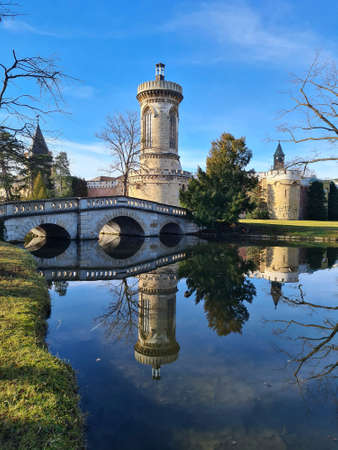 Laxenburg, Austria - January 02, 2022: Franzensburg Castle and stone bridge in public castle park, a preferred destination and film location near Viennaのeditorial素材