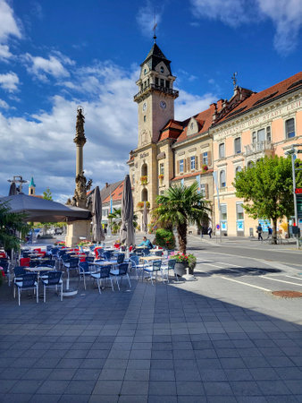 Leibnitz, Austria - September 20, 2022: Unidentified people on main square with town hall and column of the city in Southern Styriaのeditorial素材