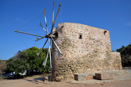 Greece, old windmill built of stone at the monastery of Toplou, located in the north-east of Creteの写真素材