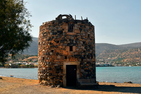 Greece, Crete, old windmills built of stone in Elounda on gulf of Mirabelloの写真素材