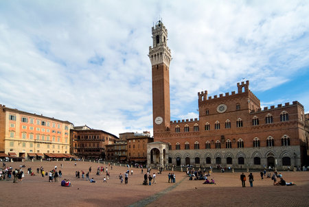 Siena, Italy - September 15, 2009: Unidentified people on Piazza del Campo - the square for the Palio race - with the Palazzo Pubblico in the UNESCO world heritage site in Tuscanyのeditorial素材