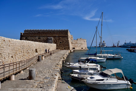 Heraklion, Greece - October 14, 2022: The capital of Crete Island, the small harbor for yachts and fishing boats with the venetian fortress Koulesのeditorial素材