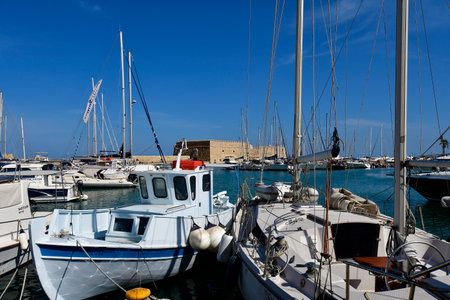 Heraklion, Greece - October 14, 2022: The capital of Crete Island, the small harbor for yachts and fishing boats with the Venetian Fortress Koulesのeditorial素材