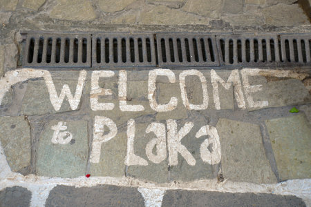 Athens, Greece - September 24, 2024: a welcome letter for visitors to the district of Plakaの写真素材