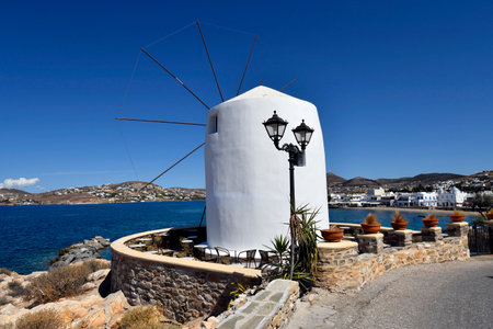 Paros, Greece - September 17, 2024: Old windmill now used as a cafe and bar in the town of Parikiaの写真素材