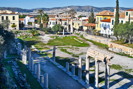 Athens, Greece - December19, 2023: Ruins in the ancient Roman Agora in Plaka district with Gate of Athena Archegetisの写真素材