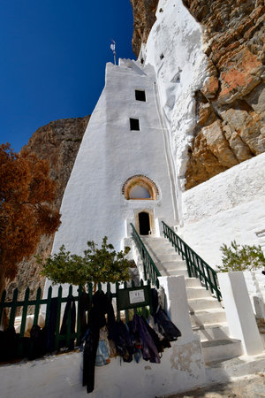 Amorgos Greece - September 09, 2025: The 9th-century monastery of Chozoviotissa is the island's highlight, an architectural gem built into a rock face with breathtaking views of the Aegean Seaの写真素材